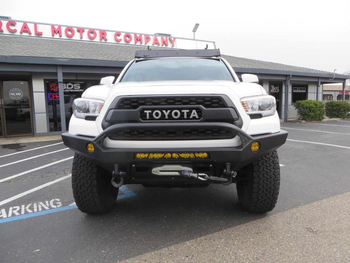 2016 White /GREY Toyota Tacoma TRD OFF-ROAD Double Cab Long Bed V6 6AT 4WD (3TMCZ5AN3GM) with an 3.5L engine, automatic transmission, located at 2630 Grass Valley Highway, Auburn, CA, 95603, (530) 508-5100, 38.937893, -121.095482 - Looking for the ultimate overlanding vehicle. Look no further than this purpose built Tacoma set up for all of your adventures. - Photo#1